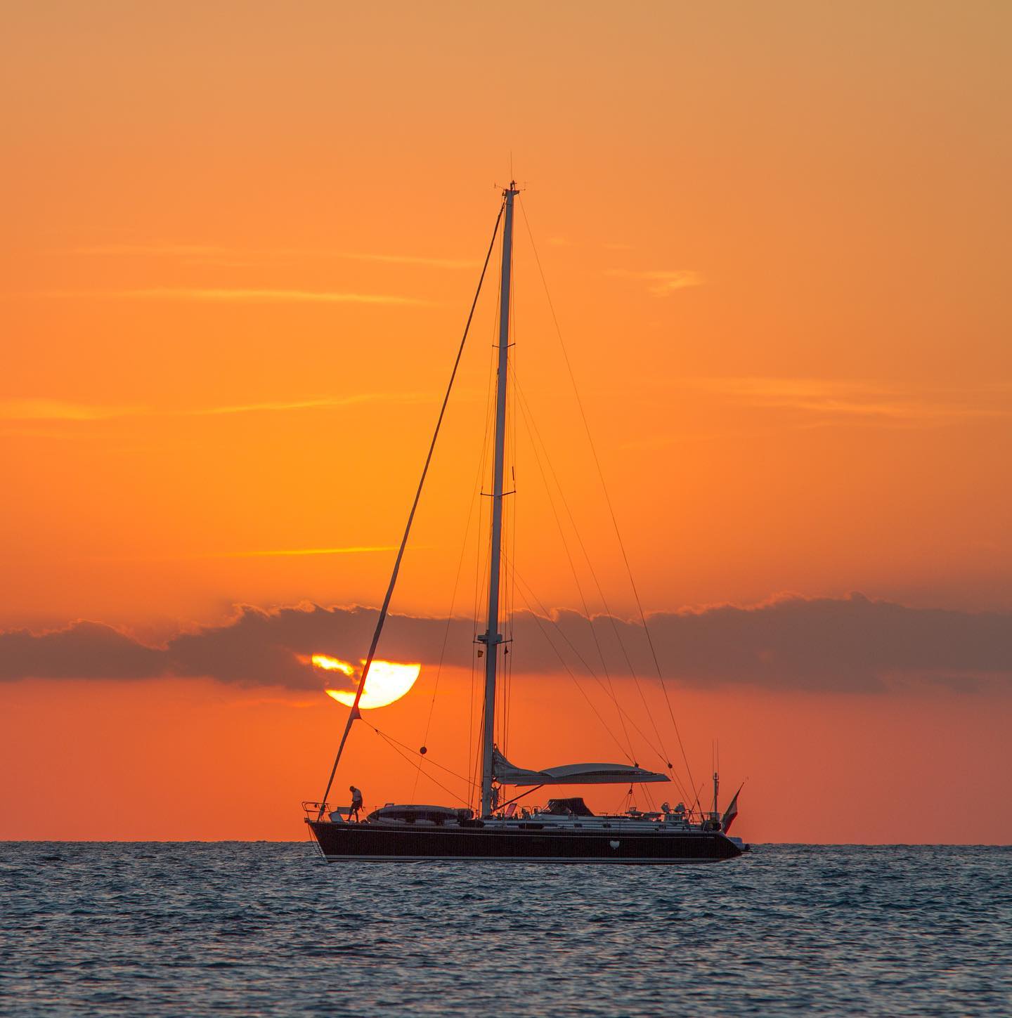 Illes Balears, PM, SpainSailboat on Body of Water during Sunset by Riccardo