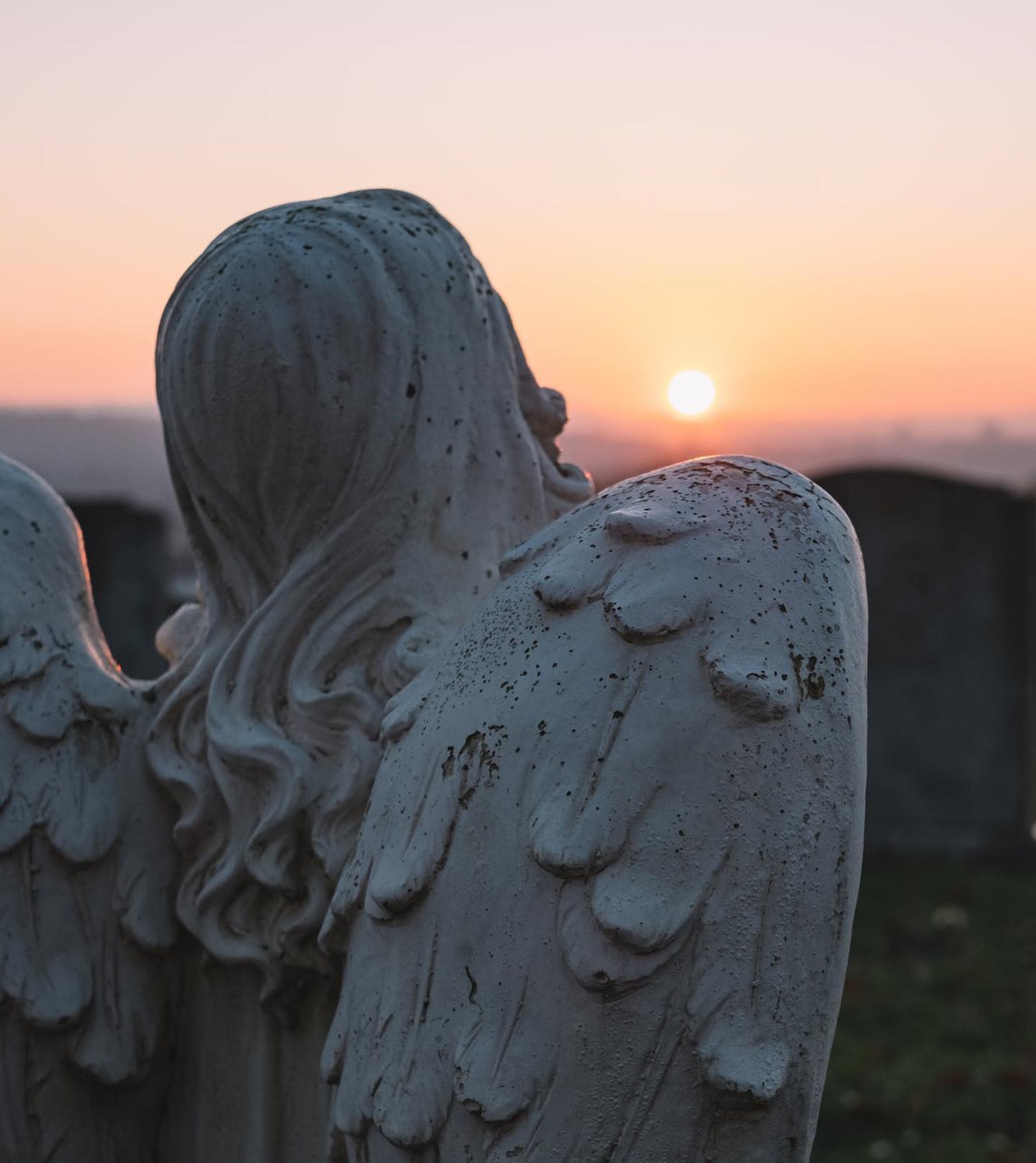 Angelic Statue and Sunset Scenery by Ellie Burgin